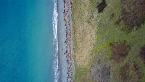 aerial beach waves shore coast