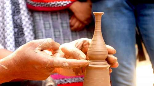 people hand pottery indoor outdoor