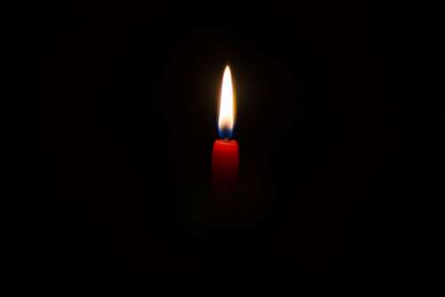 dark night candle light spark