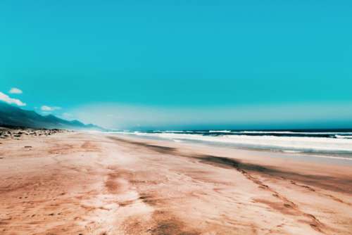 golden sand beach blue sky clear