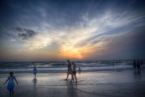 beach sunset florida ocean people