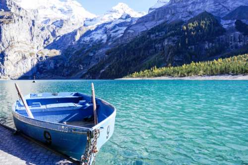 boat lake mountain row blue