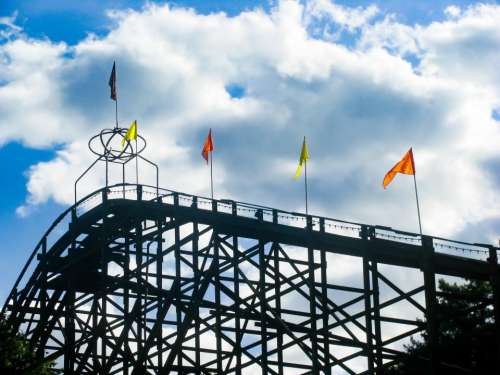 rollercoaster amusement park fun ride flags
