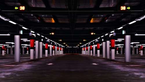 parking garage pavement arrows pillars architecture