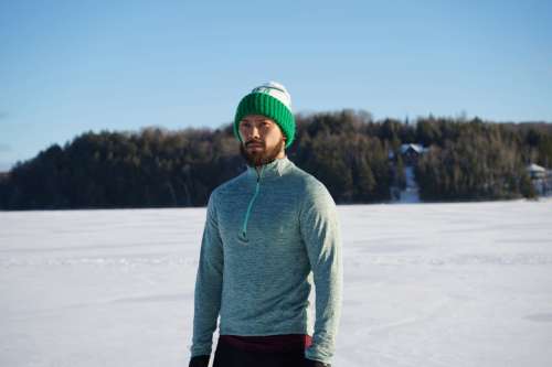 Bearded Man In Snowy Field Photo