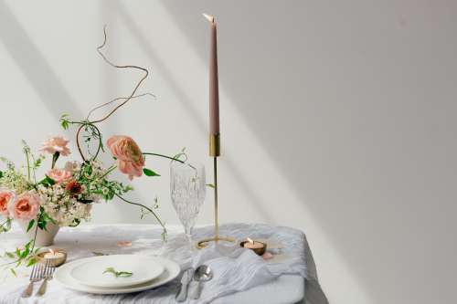 Mauve Candle on White Table Photo