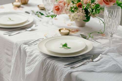 Place Setting On White Table Photo