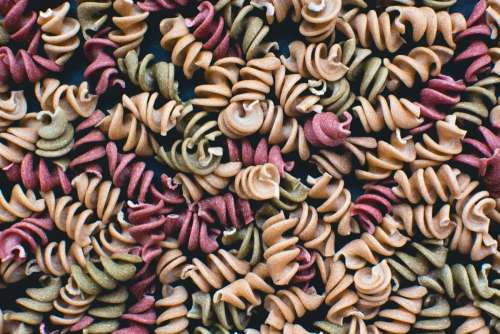 Full frame of colorful pasta fusilli