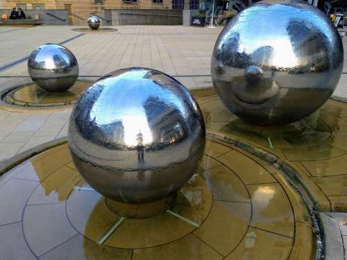 silver balls water sculpture reflections sheffield