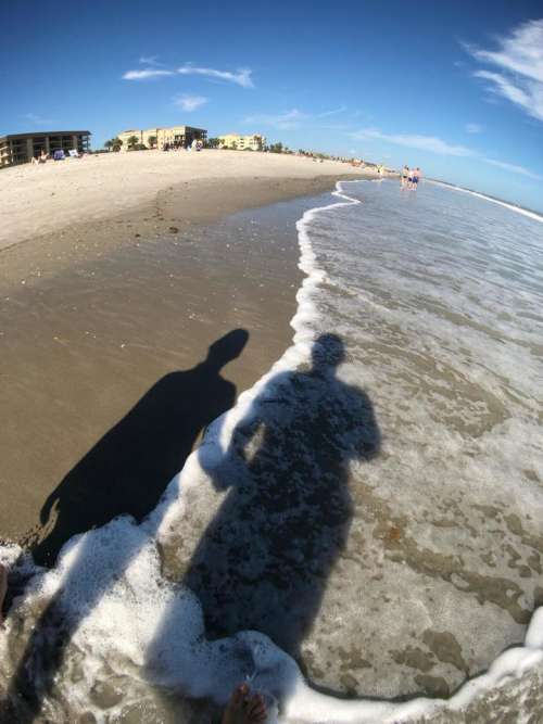 shadow light people beach seashore