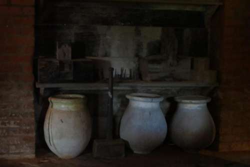 basement dark cauldrons jars spooky