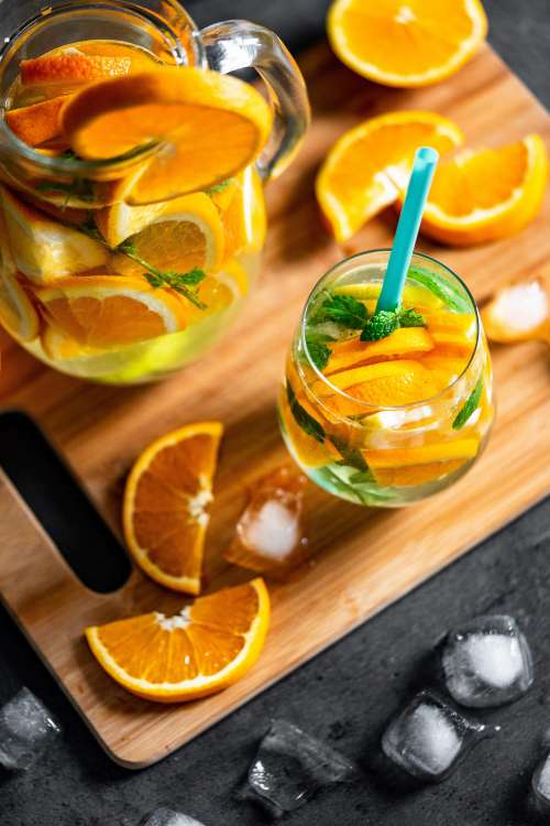 Fresh Orange Drink Vertical Free Photo
