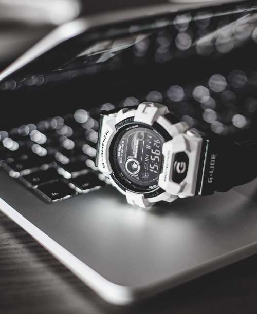 G-Shock Watches on Laptop Free Photo