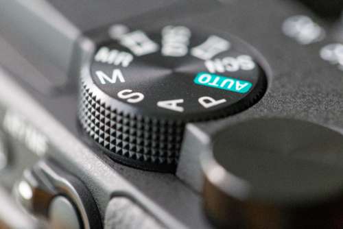 digital camera controls dials knobs