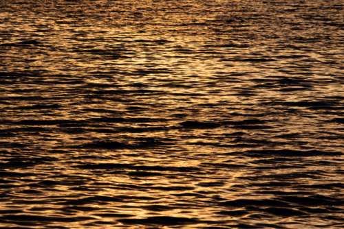 rippled water lake waves reflections