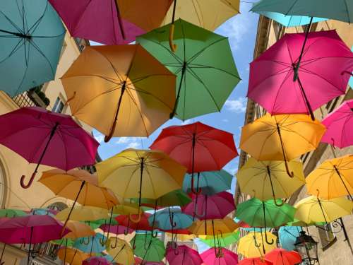 colored umbrellas street color sky