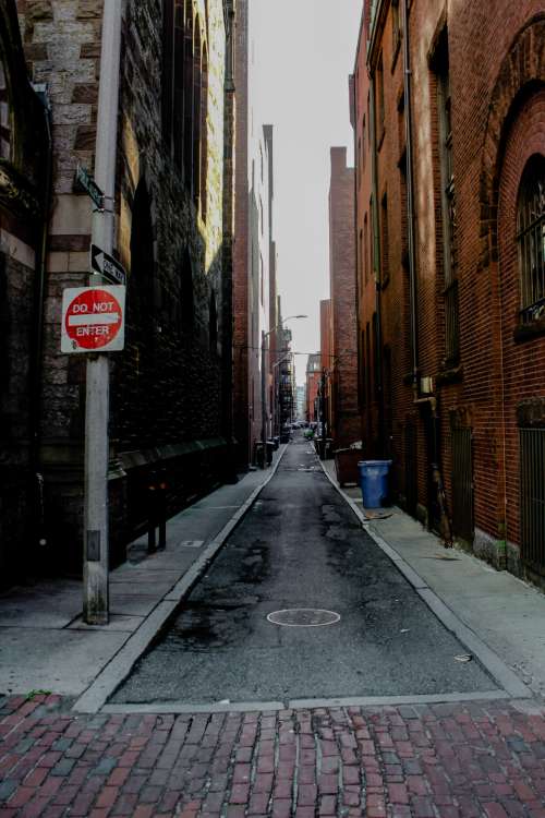 alley city street downtown brick