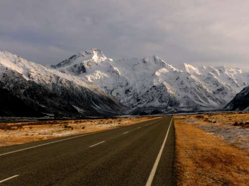 snowy mountains highway road landscape