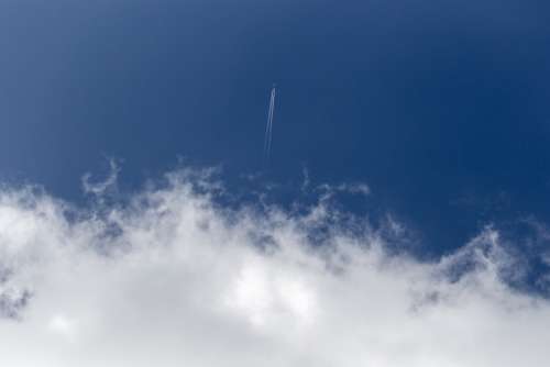 airplane trail clouds plane sky