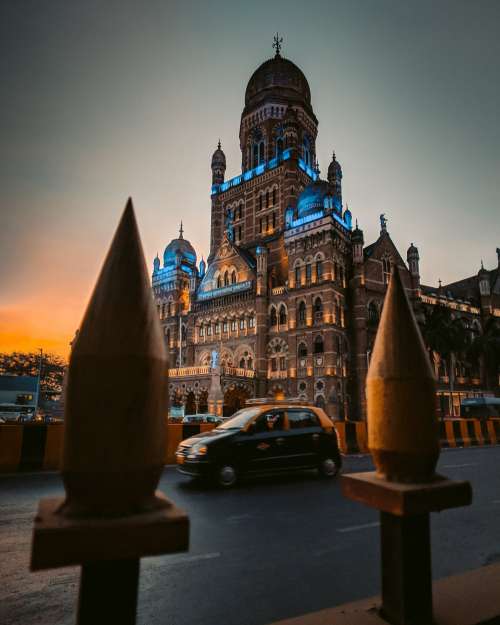 An Ornate Building Of Domes And Spires Photo