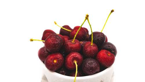 Freshly Washed Cherries On Display Photo