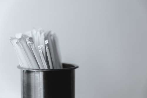 Metal Container With Straws Photo