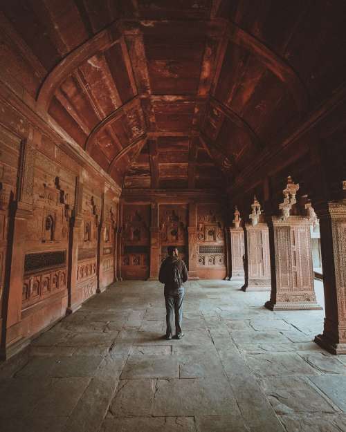 Tourist In A Buddhist Monastery Taking It All In Photo