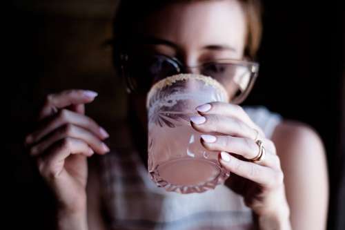 Woman Drinking Cocktail Photo