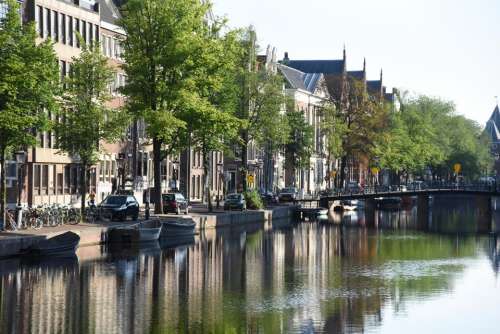 Amsterdam water reflection canal architecture