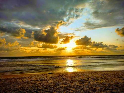 Sunset sea ocean beach golden