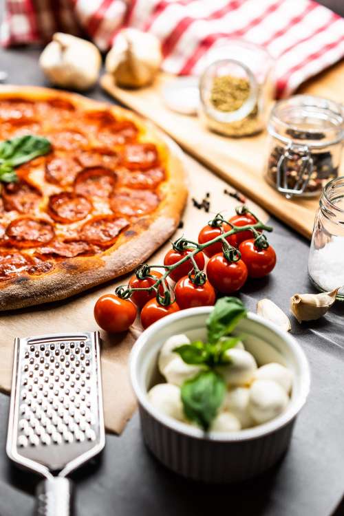 Cherry Tomatoes and Pizza Salami Free Photo