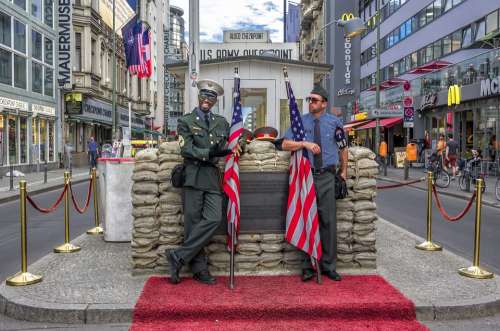 Checkpoint Charlie Berlin Germany Guards Flag