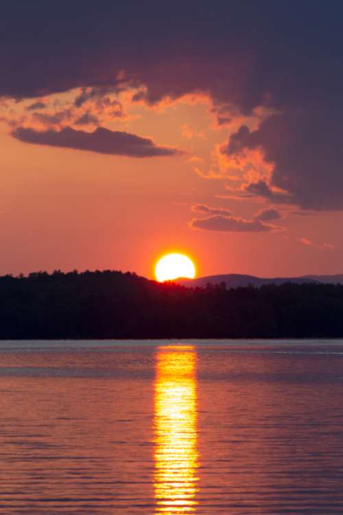 warm lake sunset orange silhouette