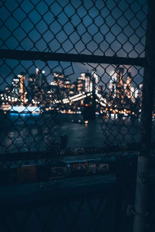 City Through A Fence Photo
