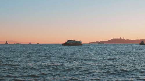 Ferry Boat At Sunset Photo