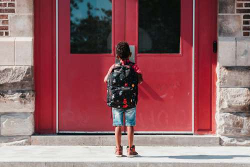 Waiting At The School Door Photo