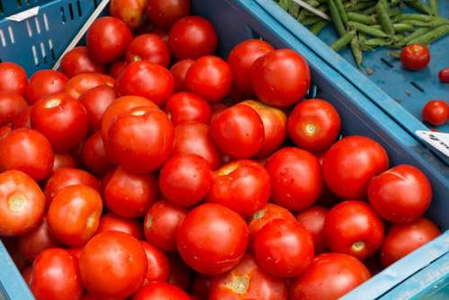 Vibrant red tomatoes on a market