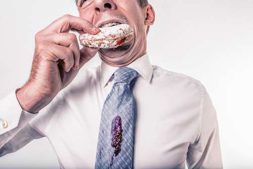 Man Eating Donut Free Photo 