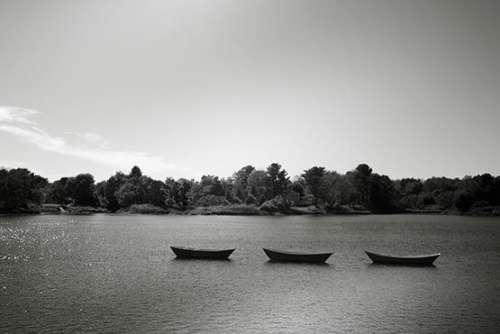 Canoes Floating on Lake Free Photo 