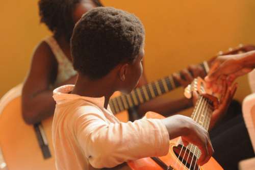Africans Playing Guitar