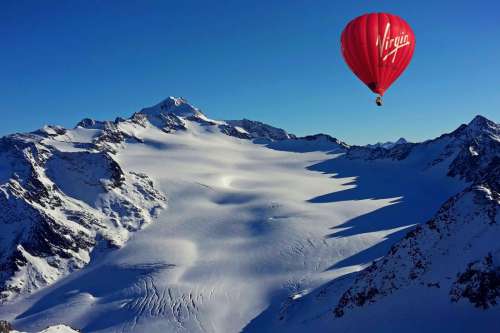 Hot Air Balloon Above Snow