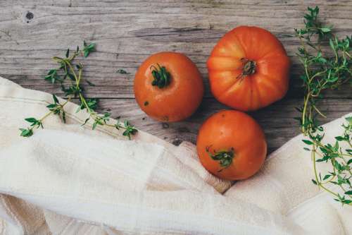 Tomatoes on Wood Table