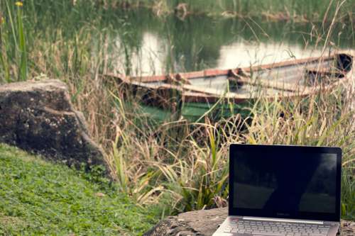 Laptop Computer Near Lake