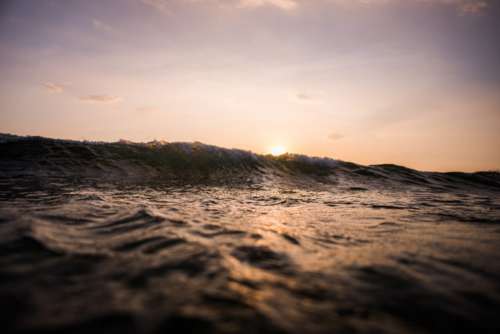 Breaking Wave at Sunset