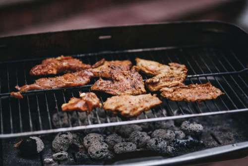 Pork and sausage on the grill