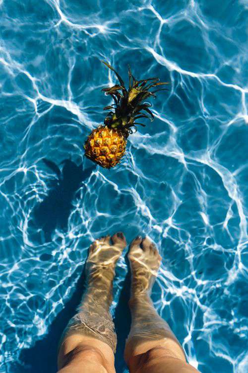 Pineapple in a swimming pool