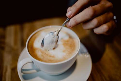 Cup of coffee on table in cafe