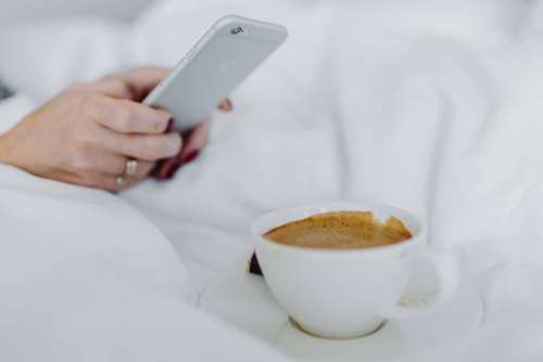 Morning coffee with chocolate in bed