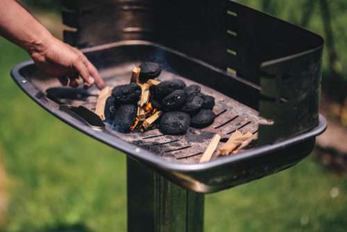 Pork and sausage on the grill