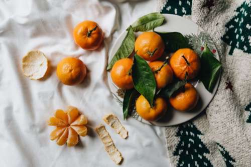 Still life of mandarin oranges with leaves